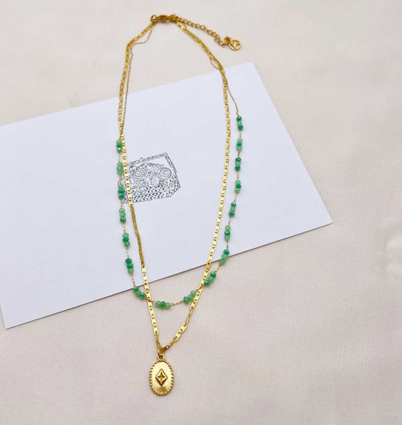 Collana doppio filo medaglietta e perline